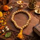Premium Wooden Knotted Jap Mala for Meditation & Chanting 27 + 1 Beads with Orange Tassel and Beige color Beads (₹30)